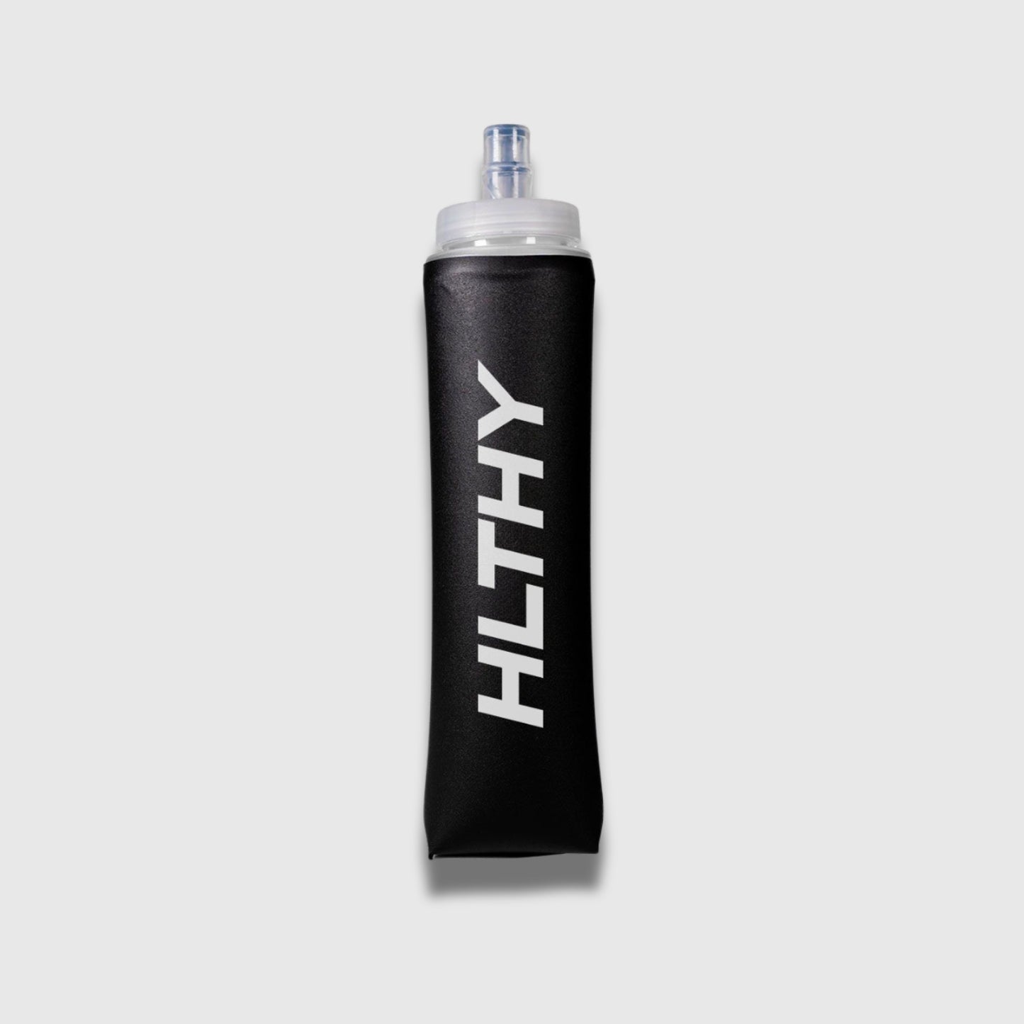 Full view of the HLTHY soft flask water bottle, featuring a collapsible 500ml design with a secure leak-proof cap and a bite valve for easy hydration during runs