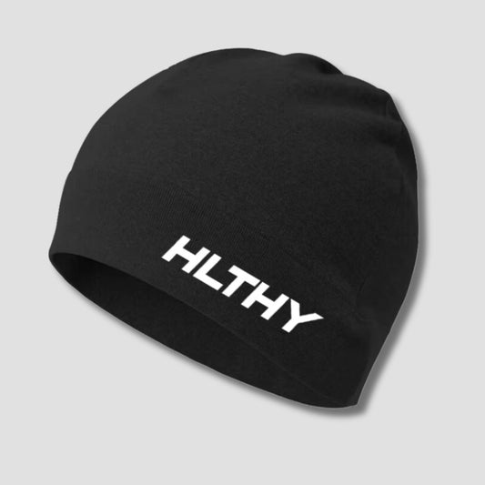 Front view of the HLTHY thermal running beanie in black, featuring a sleek, unisex design made from moisture-wicking fabric to keep runners warm and dry in cold weather
