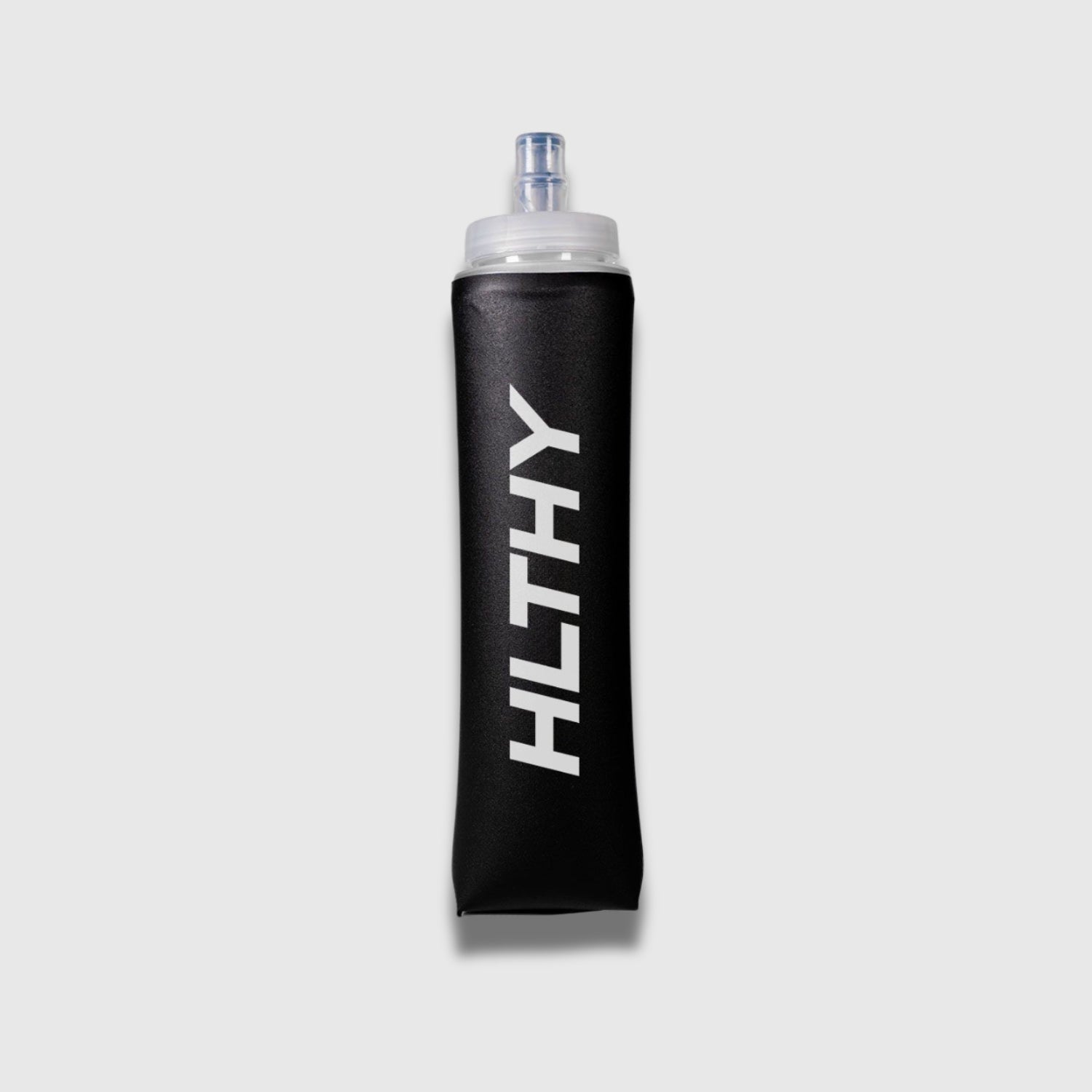 Full view of the HLTHY soft flask water bottle, featuring a collapsible 500ml design with a secure leak-proof cap and a bite valve for easy hydration during runs